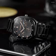 “Fashionable Black Men’s Wristwatch with Analog Display and Rubber Strap”