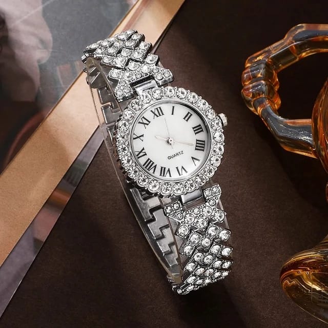 "Stunning Silver-Toned Watch with Crystal-Encrusted Round Dial and Roman Numerals"